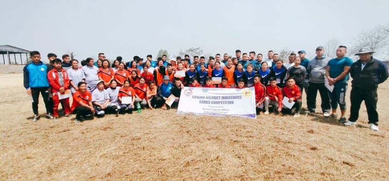 DSO Kohima, Dziesebeinuo Vizo and other officials along with winners and participants of Kohima District Level Indigenous Games Competition held at Indira Gandhi Stadium, Kohima on March 27. (DIPR Photo)